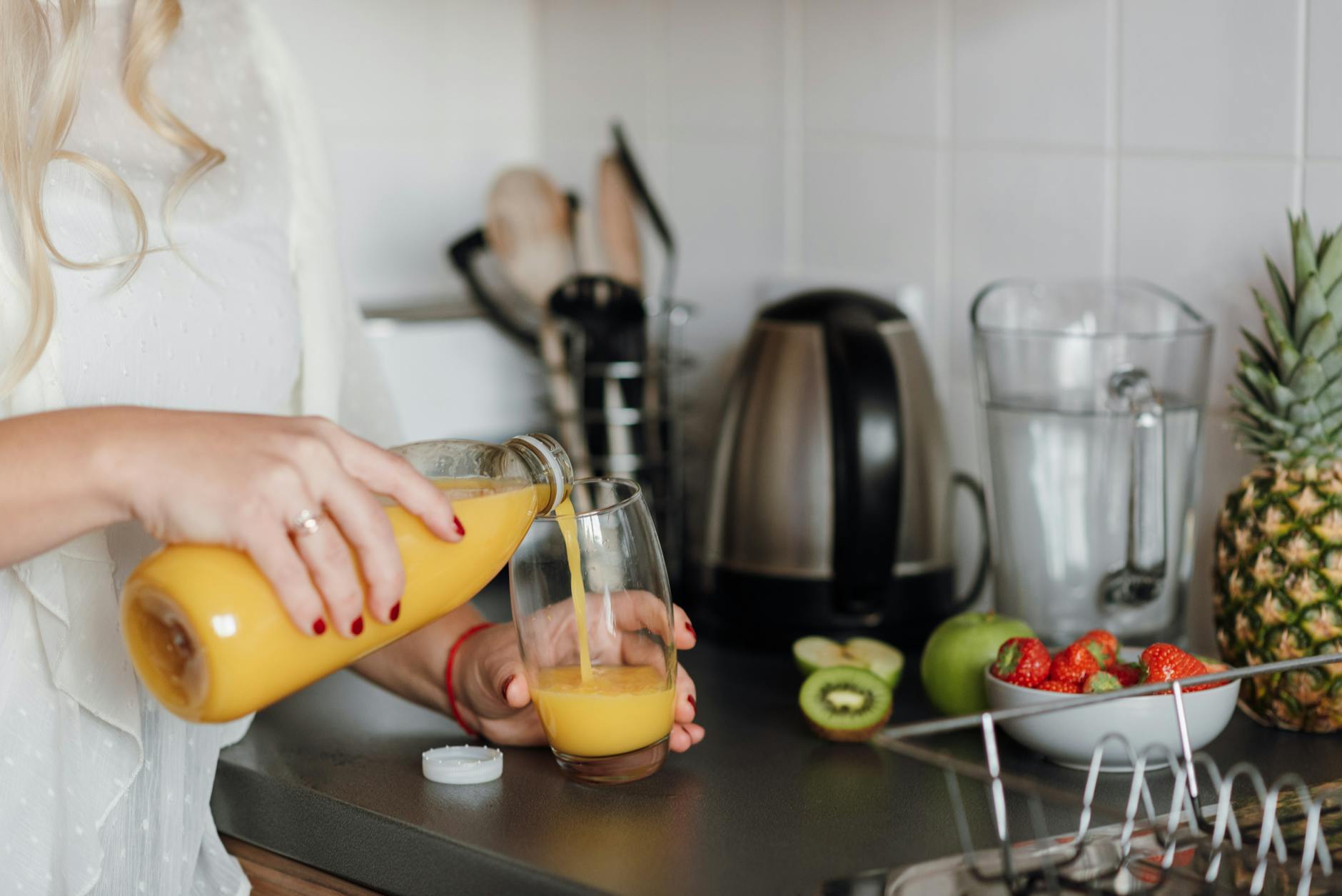 woman drinking diluted apple cider vinegar in morning routine
