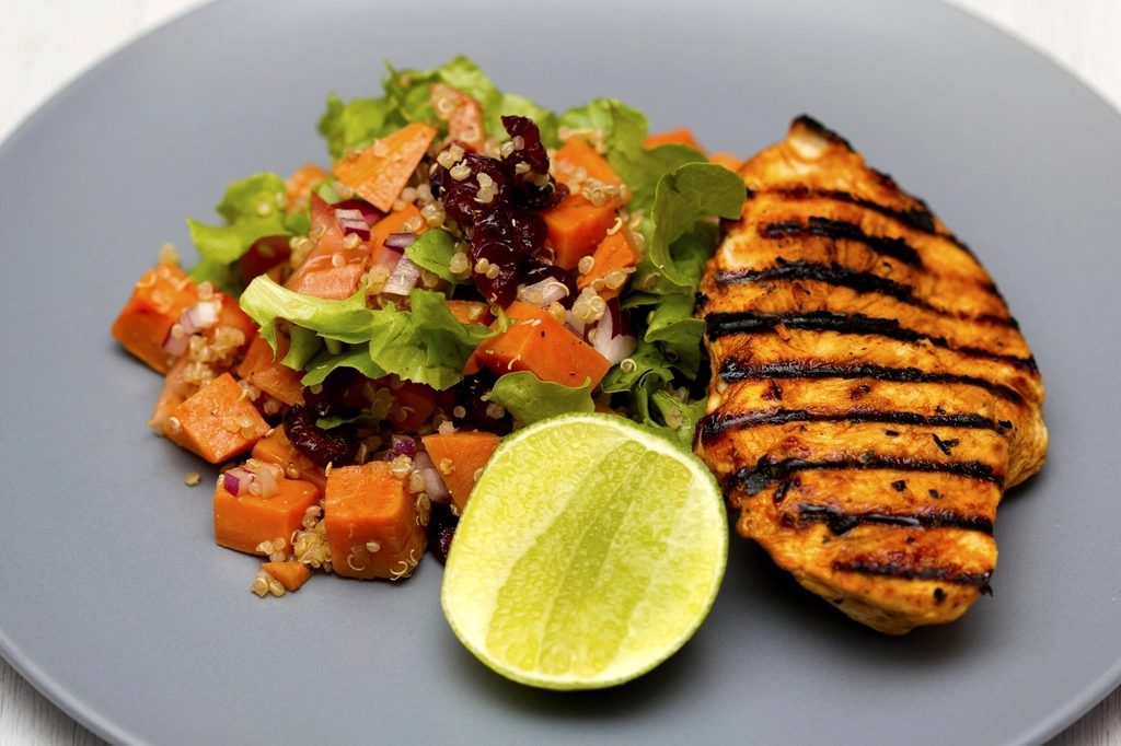 A plate built in the right order with vegetables and protein placed before the carbohydrate to flatten a blood sugar spike