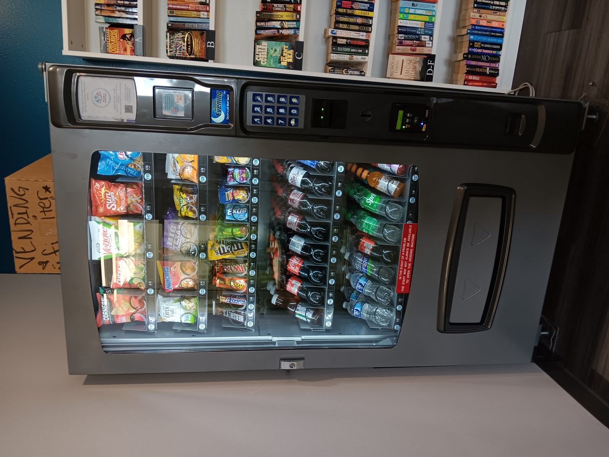 sugary sodas and processed snacks on table